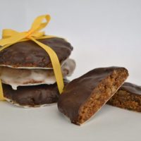 Lebkuchen the authentic German Gingerbread biscuit stacked witch a yellow ribbon around them