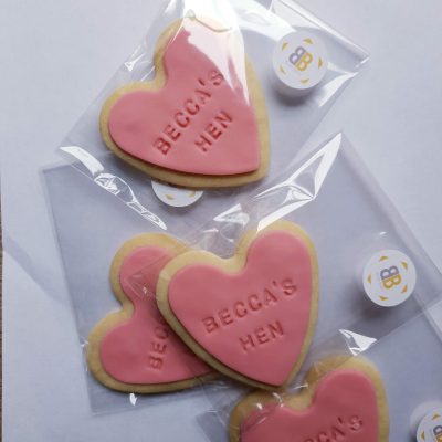 personalised pink Hen do biscuits by Bloom Bakers