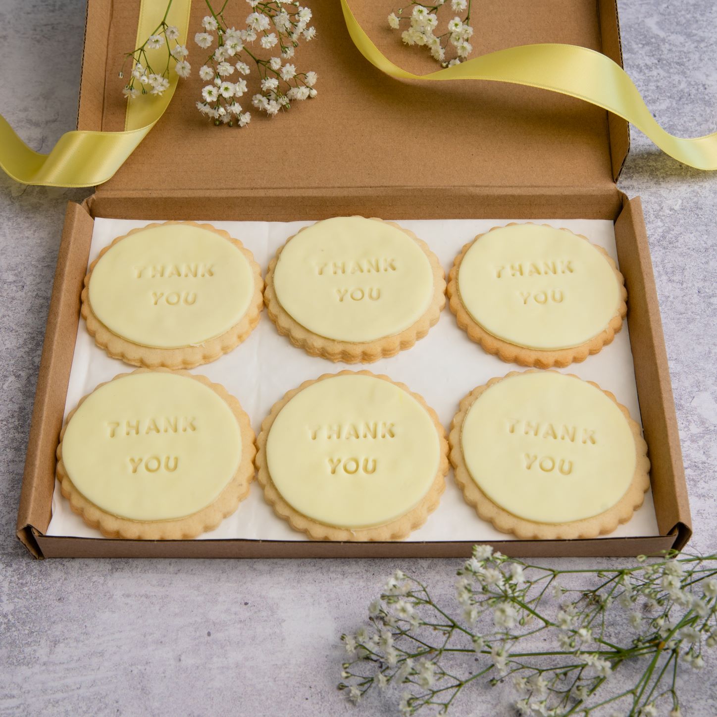 iced thank you biscuits by bloom bakers