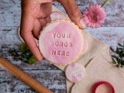 Personalised iced message biscuits by bloom Bakers
