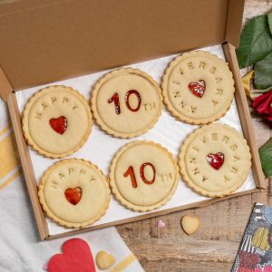 Happy anniversary biscuits made by Bloom Bakers