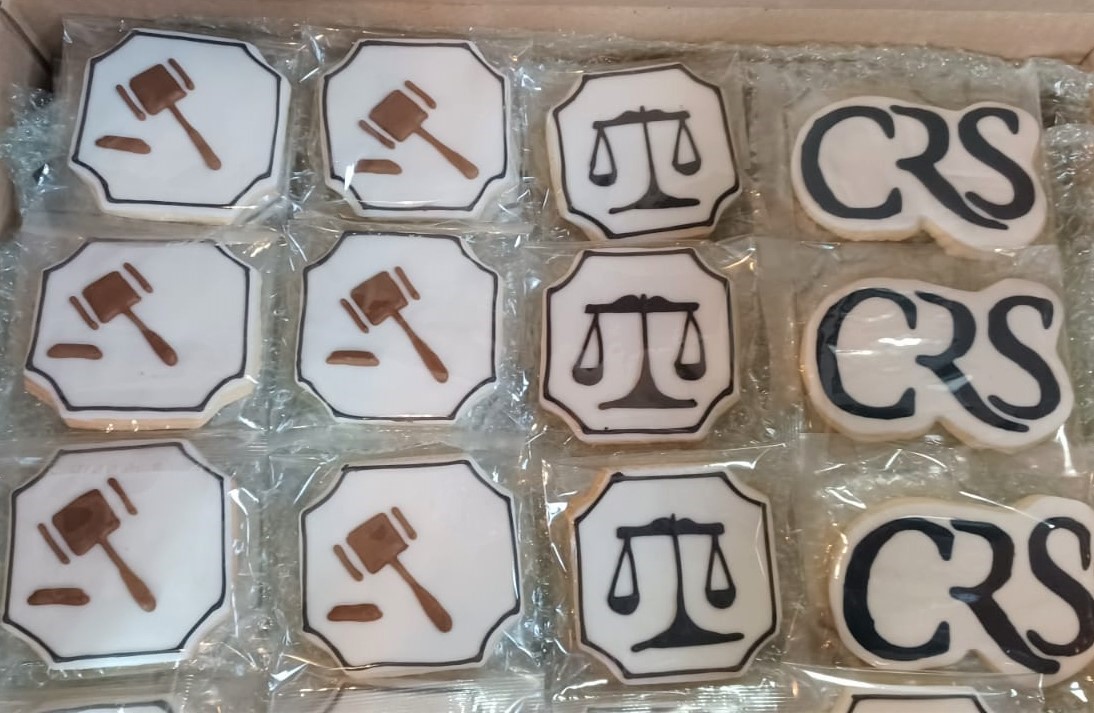 Hand iced branded biscuits for law firm