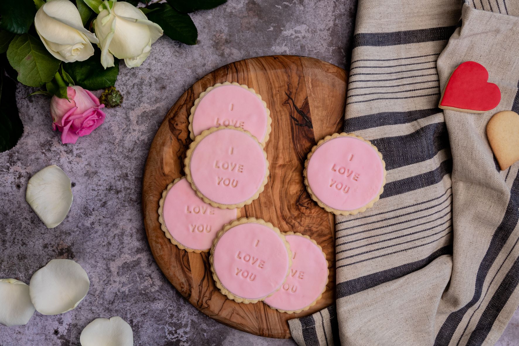 I love you fondant biscuits on a wooden tray