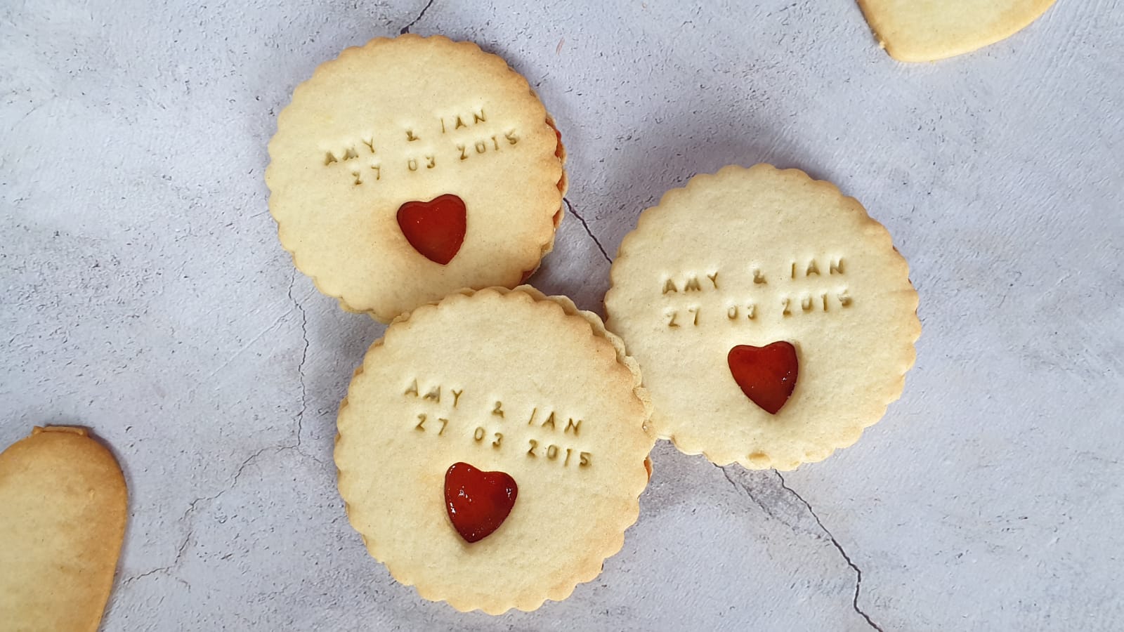 personalised wedding biscuits filled with jam made by Bloom Bakers