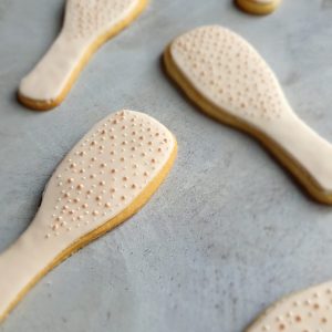 hand iced biscuits made for Tangle Teezer